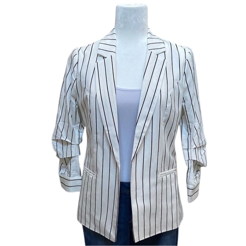 Skies are blue white/ black striped 3/2 sleevese blazer